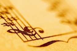 Close up treble clef and music notes. Selective focus. Copy space.