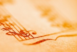 Close up treble clef and music notes. Macro image. Copy space.
