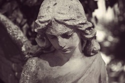 sad angel as a symbol of eternity, life and death
