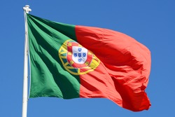 Flag of Portugal in the wind in city of Lisbon, Portugal. 
