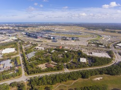 Daytona Beach International Speedway and city landscape aerial view, Daytona Beach, Florida FL, USA. It is the home for NASCAR Daytona 500.