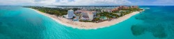 Paradise Island panoramic aerial view including Paradise Beach and The Royal Cove Reef Tower at Atlantis Hotel on Paradise Island, Bahamas.
