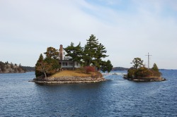 1000 islands region, World known Smallest Bridge between USA and Canada borders. Canada on the left and USA on the right. Thousand Islands, USA