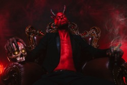 A portrait of a bad demon in his throne. Horror movie, nightmare. Halloween.