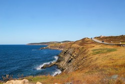 Beautiful scenery around Inverness  in Cape Breton, Nova Scotia along the Cabot Trail and its winding roads on the Atlantic Ocean in Maritime Canada during the Autumn or Fall season