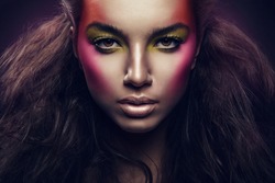 woman with magnificent hair and colorful make up