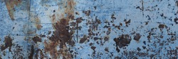 Aged cracked and painted metal surface. Old painted metal textured background. Grey blue grunge background. Hires Banner.