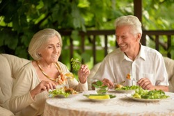 Senior couple having diner
