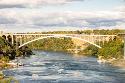 Bridge at Niagara Falls and river in Canada. 