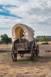 End view of a covered chuck wagon in west Texas on Fort Davis