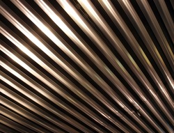 Metal ceiling background. Shiny metal bar pattern
