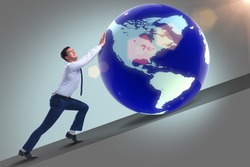 Businessman pushing earth in business concept