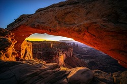 Mesa Arch also known as Rotary Arch and Trail Arch is a pothole arch on the eastern edge of the Island in the Sky mesa in Canyonlands National Park in northern San Juan County, Utah, United States.