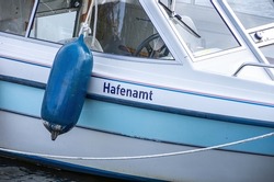Boat detail with the inscription HAFENAMT (meaning Port Authority) in the city harbour of Greifswald-Wieck, Hanseatic City of Greifswald, Mecklenburg-Western Pomerania, Germany.