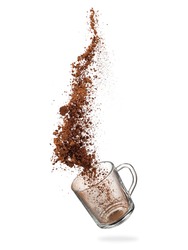 Cocoa powder up  from a glass mug on white background     
