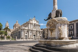 Catania, Sicily (Italy). Dome the fountain elephant (1737) and the Cathedral of Saint Agatha.