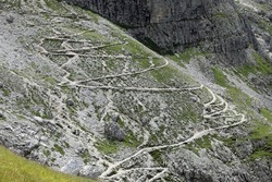 serpentine path in the Alps mountains with a zigzag pattern