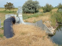 large pipe of a dewatering pump that is used to suck the water into the canal to irrigate the fields