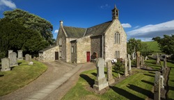 A view of the graveyard and church building in Aberlemno in Angus, Scotland