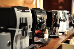 Espresso cappuccino coffee machine on the table