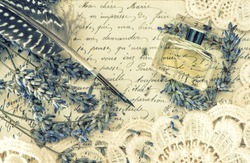 antique ink pen, perfume, old love letters and lavender flowers. retro style toned picture