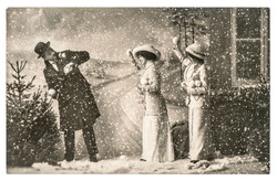 happy young people playing in snow. vintage christmas holidays picture with original scratches and film grain