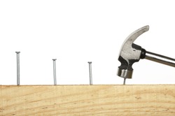 hammering consecutive nails on wood