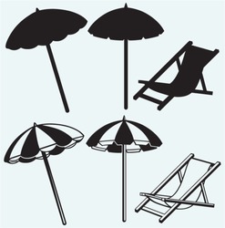 Chair and beach umbrella isolated on blue background