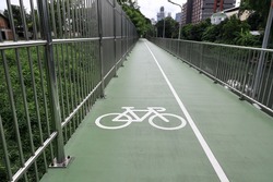 Separate bicycle lane for riding bicycles in bangkok. Ride ecological green urban transport.
