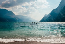 Scenic landscape of beautiful Garda lake and mountains, Italy. Nature background