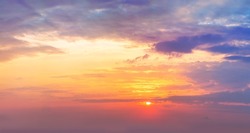 Dramaticl  sunrise sundown sky background with gentle colorful clouds without birds. Panoramic