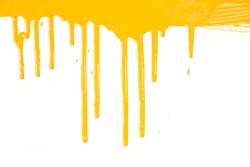 Orange paint  dripping / isolated on white background with copy space / real photo