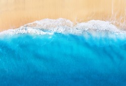 Coast with waves as a background from top view. Blue water background from drone. Summer seascape from air. Travel - image