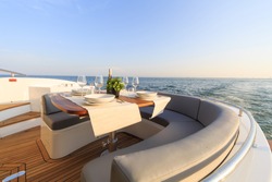 romantic lunch on motor yacht at sunset, Table setting at a luxury yacht.