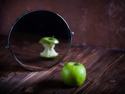 Apple reflecting in the mirror surrealistic picture abstract vision