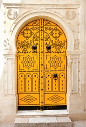 Old national Tunisian painted door in the Medina.Tunisia.