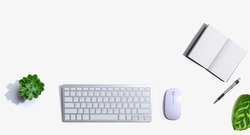Computer keyboard and mouse with notebook from above