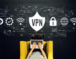 VPN concept with person using a laptop in a chair