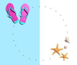 Summer concept with flip flops and starfish - flat lay