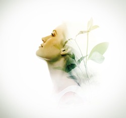 Double exposure of beautiful young woman and green leaves