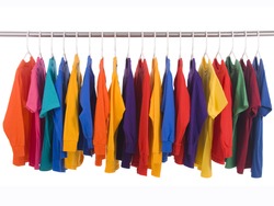 bright colored Tee Shirts hanging on a clothesline.