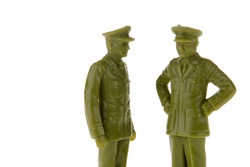 two plastic toy army generals talking