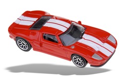 Toy red Sports car isolated over white with a clipping path