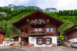 Traditional wood house in swiss village Iseltwald, Switzerland