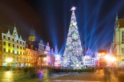 Christmas tree and light laser show on Market Square at christmas night in Wroclaw, Poland