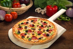 Pizza made fresh authentic recipe ingredients homemade home cooked healthy organic toppings