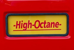 High Octane sign at classic fuel pump on red background