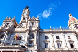 Valencia City Hall building . Facade of baroque architecture with cupola and towers. Ajuntament de Valencia