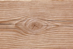 Brown pine board with knot pattern and cracks texture