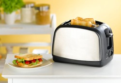 Modern design of the bread toaster in the kitchen interior
